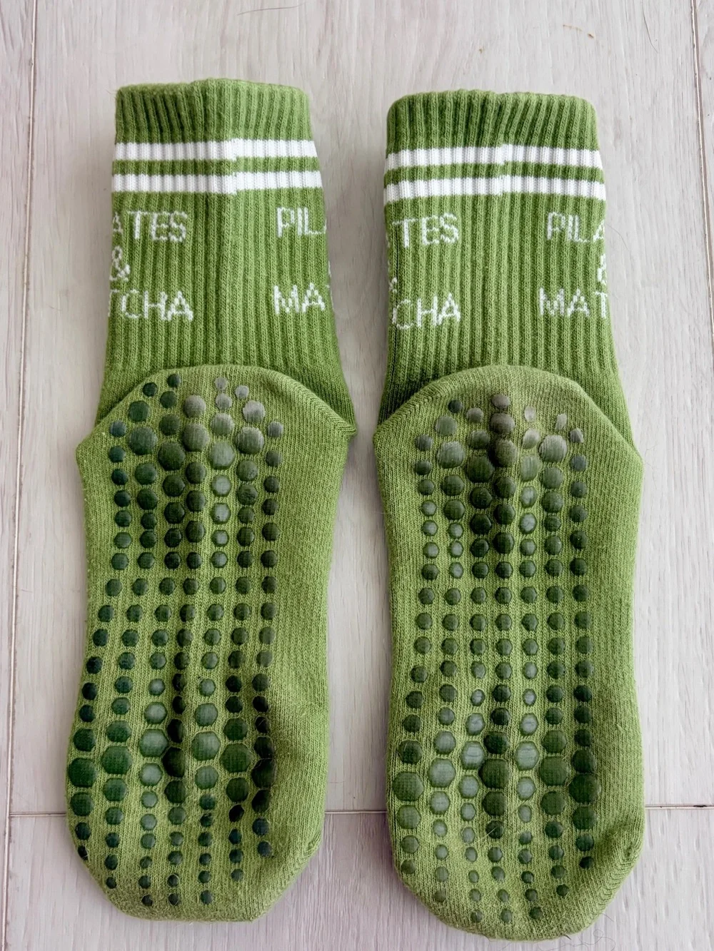 4 pairs of very gently used Pilates grip socks - crew length - women’s S/M.